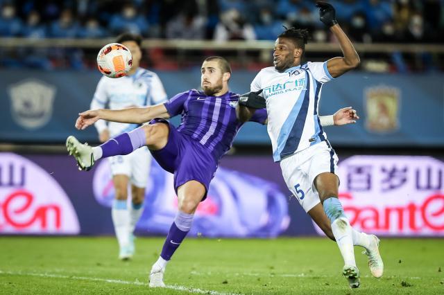 九游娱乐-哈兰德式进球+防守滴水不漏 他才是津门虎主心骨